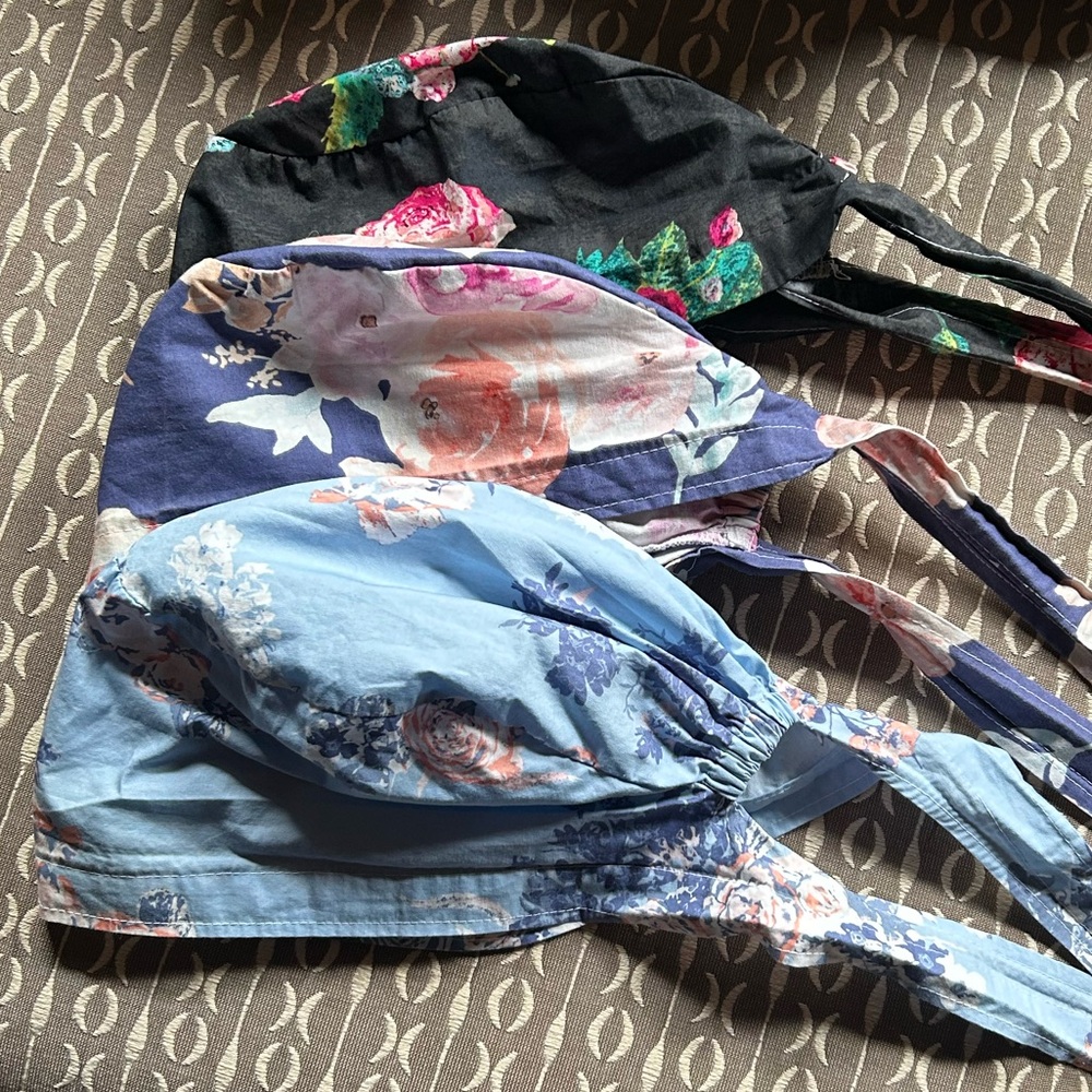 Trio of floral scrub caps